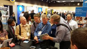 trade show trivia game with highly engaged attendees conferring